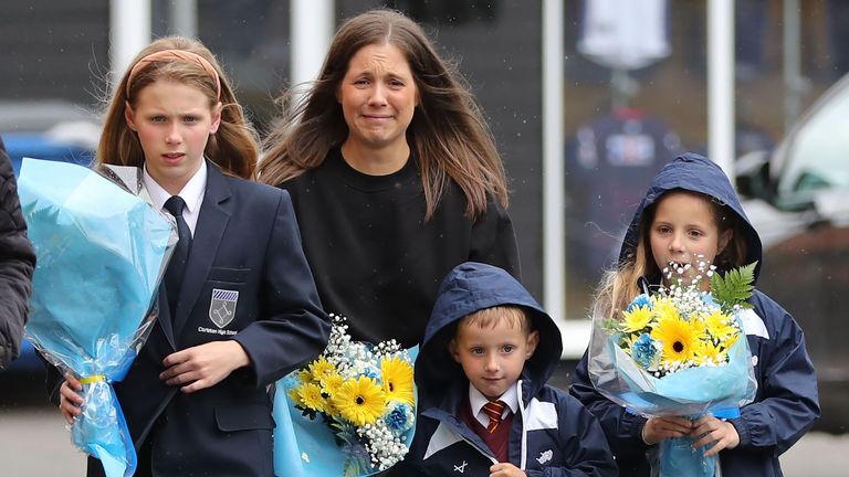 Rob Burrow's wife Lindsey Burrow and their children Jackson, Maya and Macy arrive at the Leeds Rhinos stadium to lay flowers. Pic: Ben Lack Photography Ltd