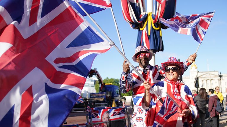 Royal fans on the The Mall ahead of the Trooping the Colour ceremony.
Pic: PA