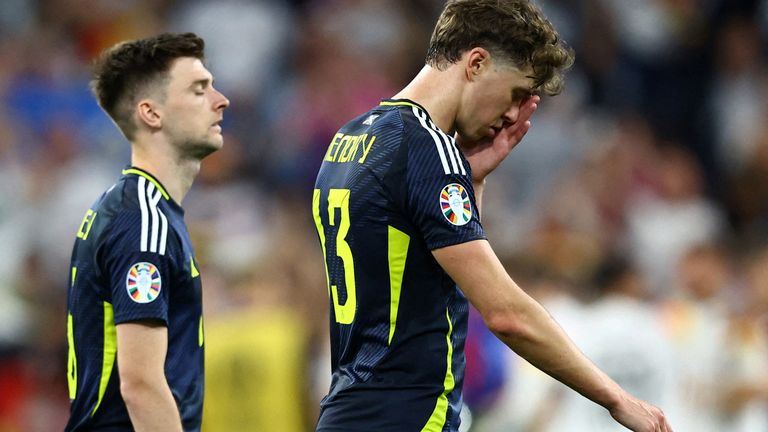 Kieran Tierney and Jack Hendry looked dejected after the thrashing. Pic: Reuters