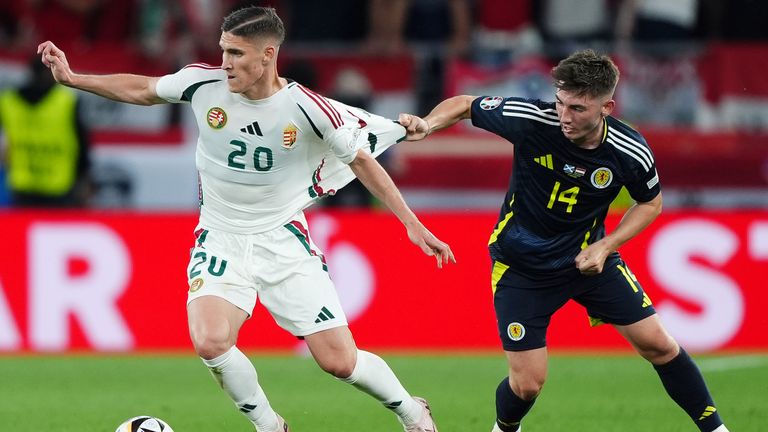 Scotland's Billy Gilmour (right) and Hungary's Roland Sallai battle for the ball during the UEFA Euro 2024 Group A match at the Stuttgart Arena in Stuttgart, Germany. Picture date: Sunday June 23, 2024.


