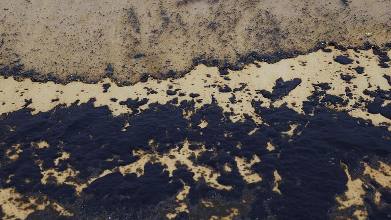 A view of an oil slick at Tanjong Beach in Sentosa, Singapore.
Pic: Reuters