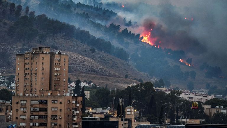 Smoke and fire covers the area following rocket attacks from Lebanon, amid ongoing cross-border hostilities between Hezbollah and Israeli forces, near Kiryat Shmona, Israel, close to its border with Lebanon, June 3, 2024. REUTERS/Ayal Margolin ISRAEL OUT. NO COMMERCIAL OR EDITORIAL SALES IN ISRAEL TPX IMAGES OF THE DAY
