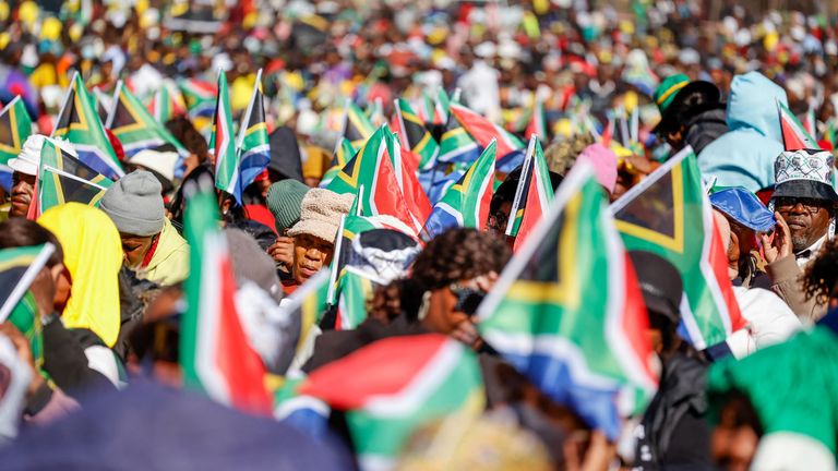 People gather, on the day of the inauguration ceremony of South Africa's president elect Cyril Ramaphosa, at the Union Buildings in Pretoria, South Africa, June 19, 2024. REUTERS/ Alet Pretorius
