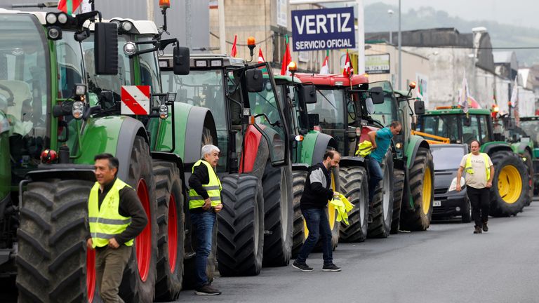 Spanish farmers gather before taking their tractors to the French-Spanish border for a 24-hour blockage at several points including Irun and La Junquera in Catalunya, to protest a situation of rising costs, low prices for their produce, and European Union regulation which they consider unsustainable, in Astigarraga, Spain, June 3, 2024. REUTERS/Vincent West
