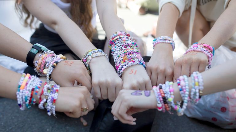 Fans display their bracelets as they wait to enter Wembley Stadium in London, ahead of Taylor Swift's first London concert, during her Eras Tour.
Pic: PA