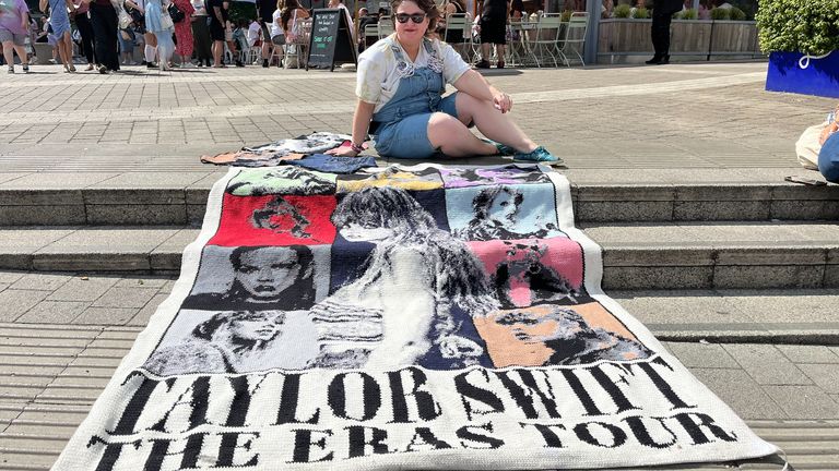 Jen Neal, who crocheted a Taylor Swift blanket over 50 hours, shows off her work outside Wembley
