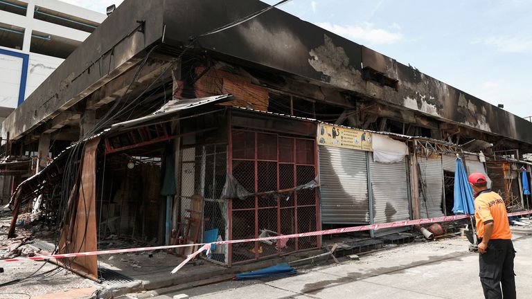 Dozens of shops were destroyed in the fire. Pic: Reuters
