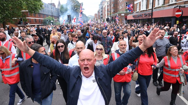 People take part in a protest march through London, organised by Tommy Robinson, whose real name is Stephen Yaxley Lennon. Groups from across the UK linked to football disorder are expected to attend the event the Metropolitan Police said. Picture date: Saturday June 1, 2024.