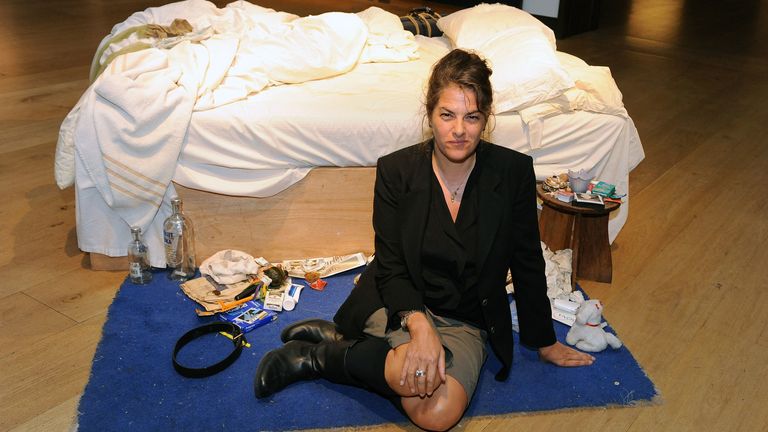 Artist Tracey Emin sits by her work 'My Bed' which is on the market for the first time offered for sale at Christie's in  central London to benefit the Saatchi Gallery's foundation. PRESS ASSOCIATION Photo. Picture date: Friday June 27, 2014. See PA story SALE Emin. Photo credit should read: Nick Ansell/PA Wire 