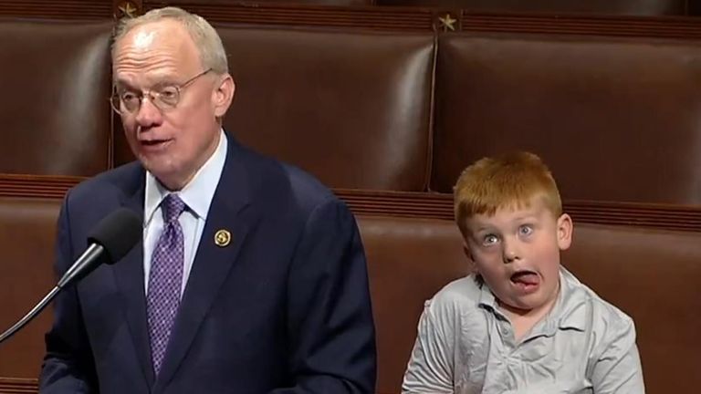 Republicans son pulls funny faces during speech in House of Representatives