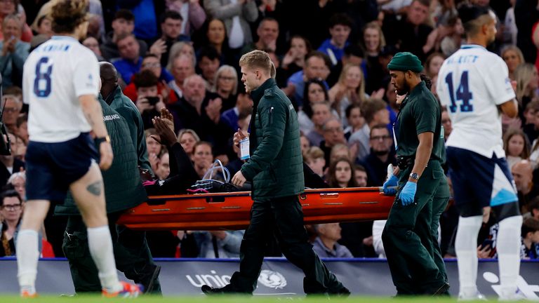 Soccer Football - Soccer Aid for UNICEF - England v Soccer Aid World XI - Stamford Bridge, London, Britain - June 9, 2024 Soccer Aid World XI's Usain Bolt is taken off on a stretcher after sustaining an injury Action Images via Reuters/Andrew Couldridge