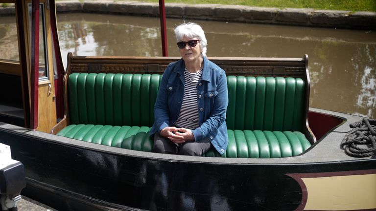 Retired bed and breakfast owner Hilary Thomas sits on the Bench Across Britain