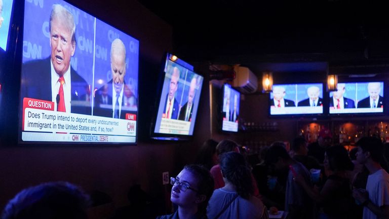 People attend a watch party for the first U.S. presidential debate hosted by CNN in Atlanta, at Union Pub on Capitol Hill in Washington.
Pic: Reuters