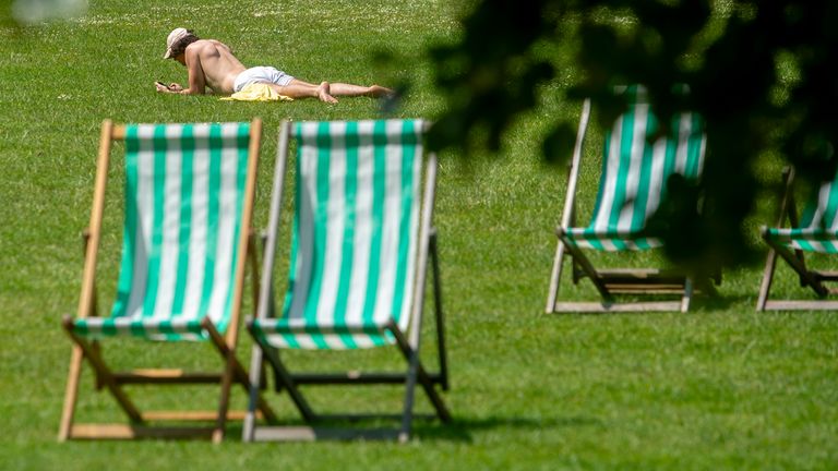 The public enjoys the summer sun in Green Park, London. Pic: PA