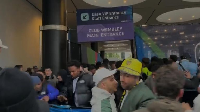 Ticketless fans attempt to enter Wembley stadium