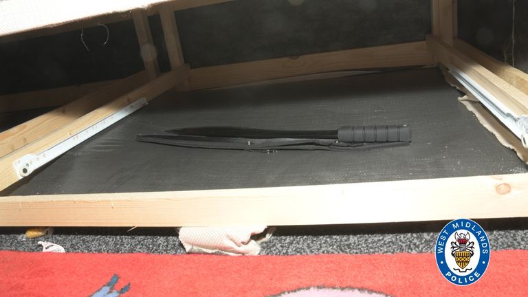 A machete hidden under a bed, which was found by officers investigating the killing of Shawn Seesahai. Pic provided by West Midlands Police via Becky Cotterill