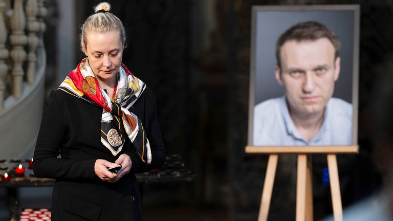 Yulia Navalnaya, widow of Russian opposition leader Alexei Navalny walks away from his picture after lighting a candle at the end of a service in St. Mary's Church on the occasion of his birthday, in Berlin.
Pic: AP