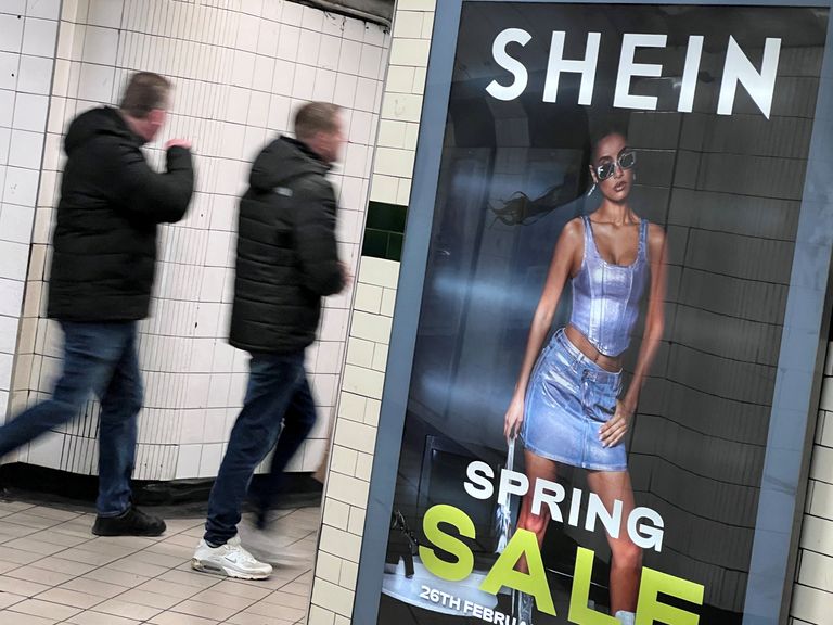 People walk past an advertisement for Shein, in London, Britain, March 8, 2024. REUTERS/Suzanne Plunkett