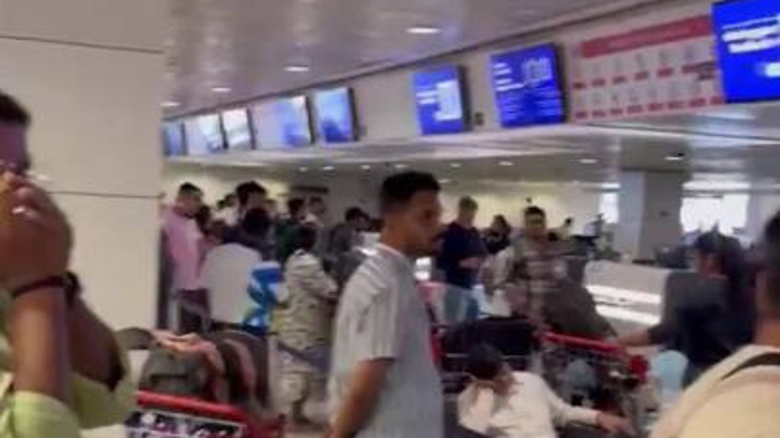 Airports across the world in chaos amid IT outage | World News | Sky News