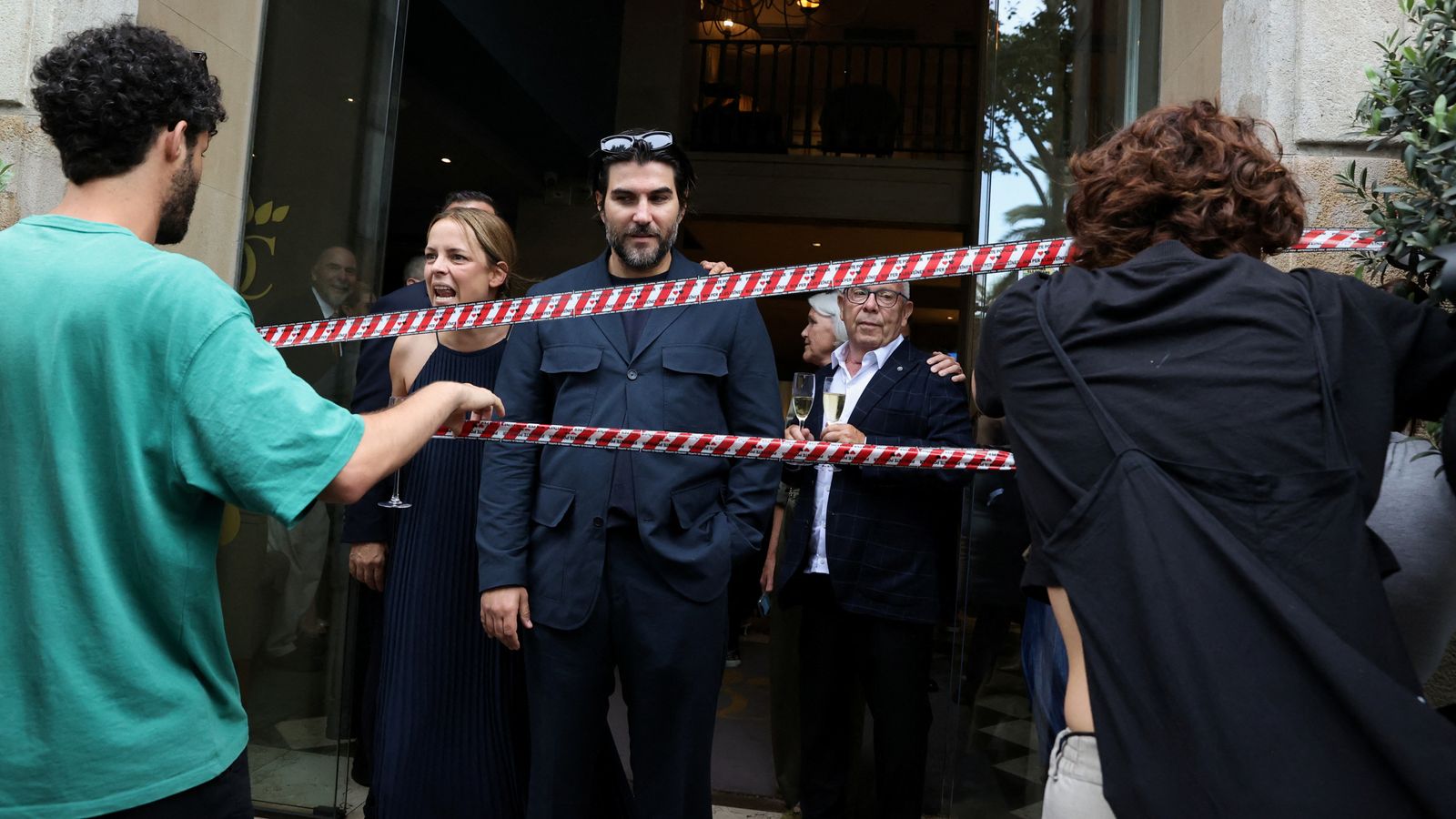 Anti-tourism protesters target diners with water guns in Barcelona ...