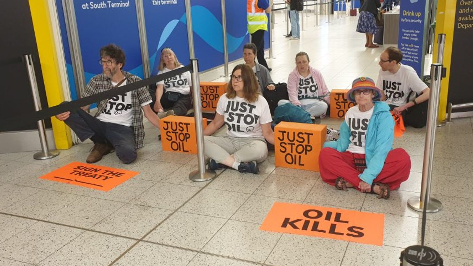 Just Stop Oil activists arrested at Gatwick Airport after departure gate protest