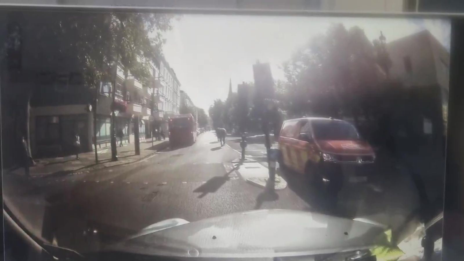 Chaos as military horses throw riders off before bolting through ...