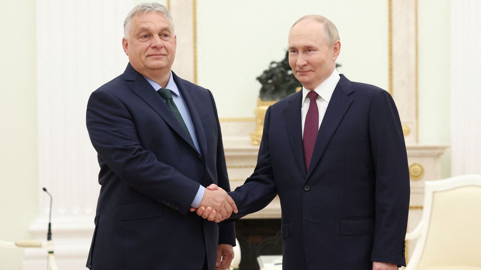 'Don't shake hands with a bloody dictator': Anger over Hungary PM's talks with Vladimir Putin