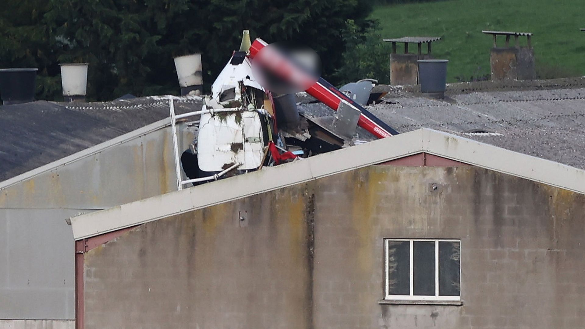 Two people killed after helicopter crashes into building in Ireland