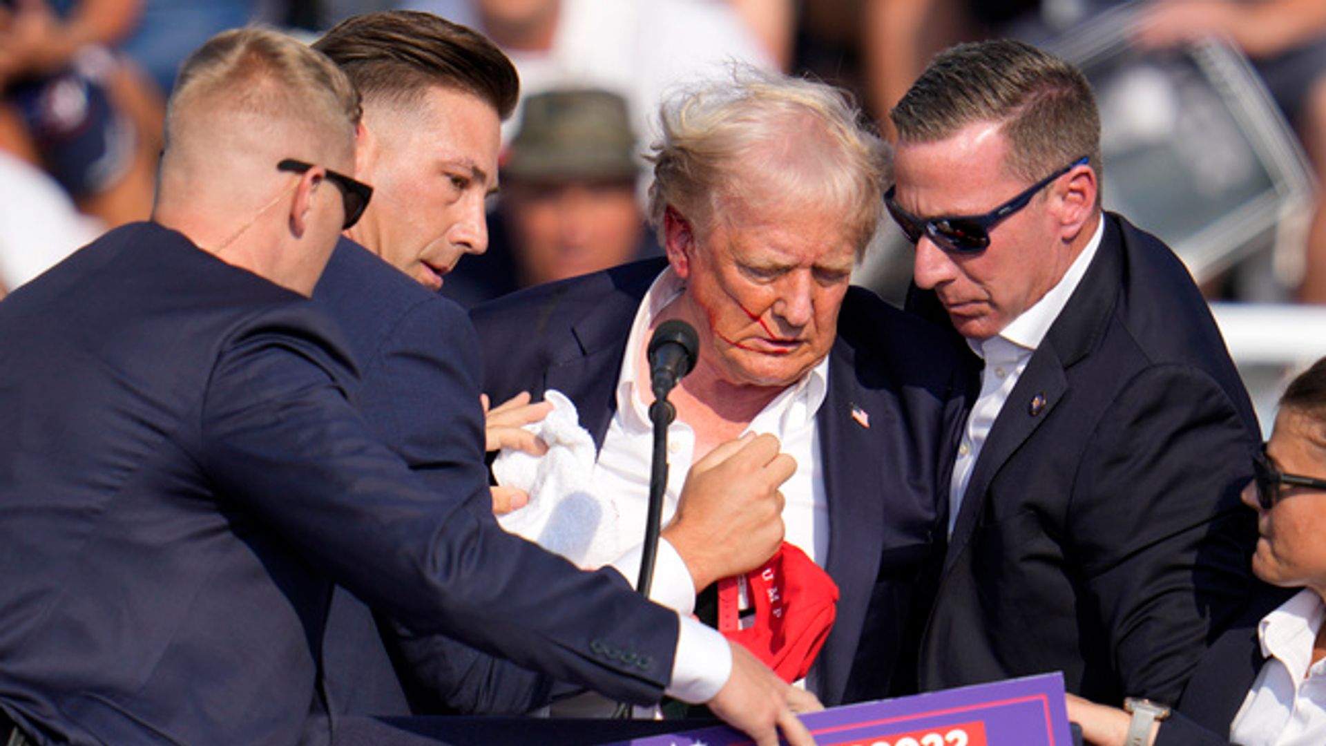 Two reportedly dead at Donald Trump rally - as former president injured and rushed off stage
