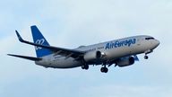 A Air Europa Boeing 737 approaches for landing in Lisbon at sunrise, Wednesday, July 5, 2023. (AP Photo/Armando Franca)