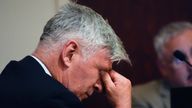 Alec Baldwin wipes his eyes during a preliminary hearing in his involuntary manslaughter trial over a fatal shooting on the set of the film, "Rust," in Santa Fe, N.M., Monday, July 8, 2024. (AP Photo/Ross D. Franklin, Pool)