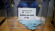 Envelopes lie in a ballot box in the second round of the early French parliamentary elections, at a polling station in Paris. Pic: Reuters