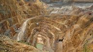 View into the base of the pit of a large open cast gold mine. Pic: iStock