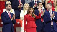 Former first lady Melania Trump waves as she is flanked by vice presidential nominee Senator J.D. Vance (R-OH) and Donald Trump Jr., as Republican presidential nominee and former U.S. President Donald Trump speaks on Day 4 of the Republican National Convention (RNC), at the Fiserv Forum in Milwaukee, Wisconsin, U.S., July 18, 2024. REUTERS/Andrew Kelly