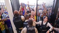 Jul 14, 2024; Miami, FL, USA; fans rush the gates before the Copa America Final match between Argentina and Colombia at Hard Rock Stadium. Mandatory Credit: Nathan Ray Seebeck-USA TODAY Sports TPX IMAGES OF THE DAY