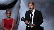 Prince Harry received his award. Pic: AP