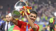 Rodri celebrates with the trophy after Spain won Euro 2024. Pic: AP