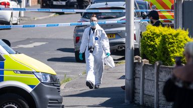 A police scenes of crime officer works at the scene in Southport. Pic: PA