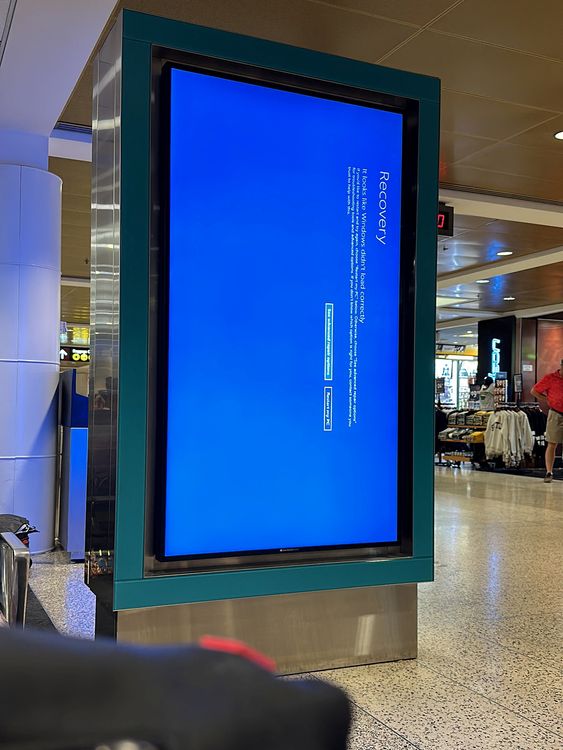 A blue error screen at Seattle's Tacoma Internation Airport. Pic: Reuters