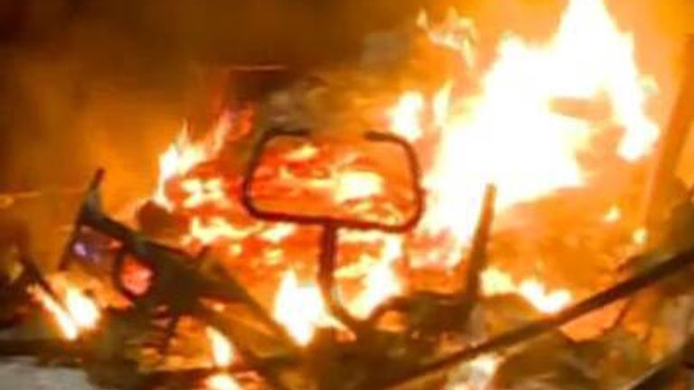 Wildfires tear through homes and cars in California