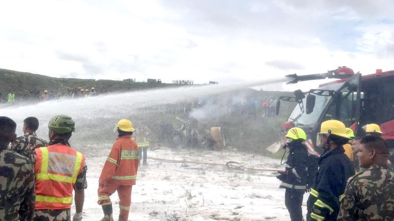 Emergency services work at the accident site. Pic: NepaliArmyHQ/Reuters