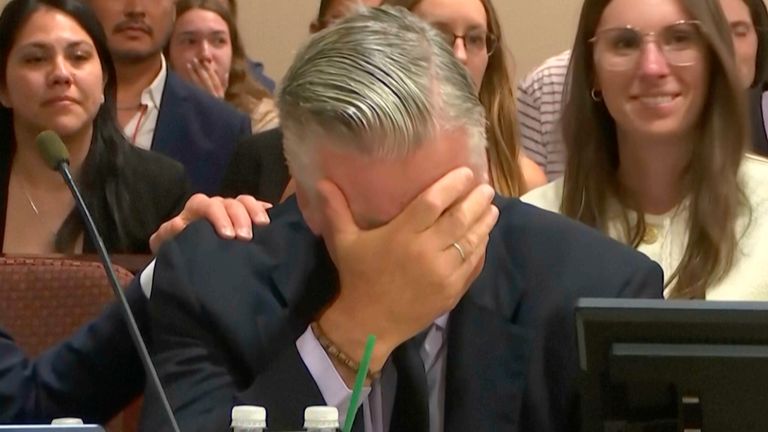 Actor Alec Baldwin reacts after the judge threw out the involuntary manslaughter case for the 2021 fatal shooting of cinematographer Halyna Hutchins during filming of the Western movie &#34;Rust,&#34; Friday, July 12, 2024, at Santa Fe County District Court in Santa Fe, N.M. (Pool Video via AP)
