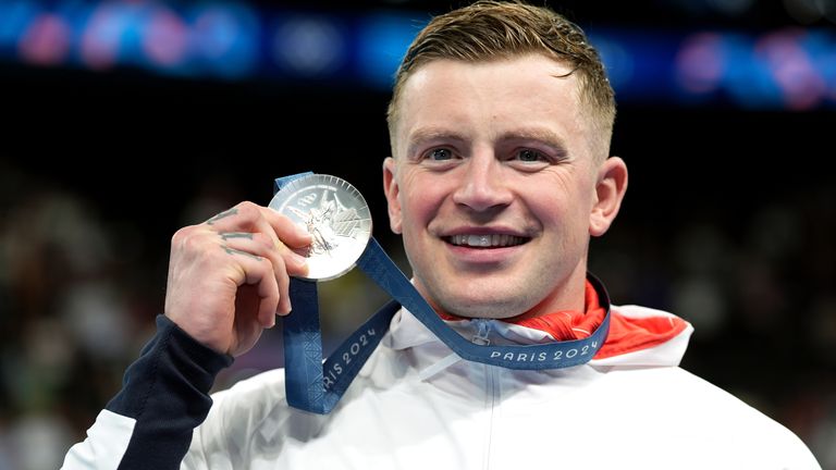 Britain's Adam Peaty with his silver medal. Photo: PA