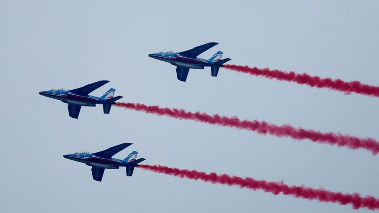 Aircraft of the Patrouille de France are seen flying over Paris during the opening ceremony.
Pic Reuters