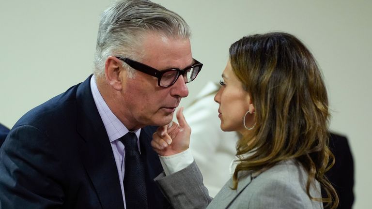 Hilaria Baldwin speaks to her husband, actor Alec Baldwin, during his trial for involuntary manslaughter for the 2021 fatal shooting of cinematographer Halyna Hutchins during filming of the Western movie Rust. Pic: Ramsay de Give/Pool via AP