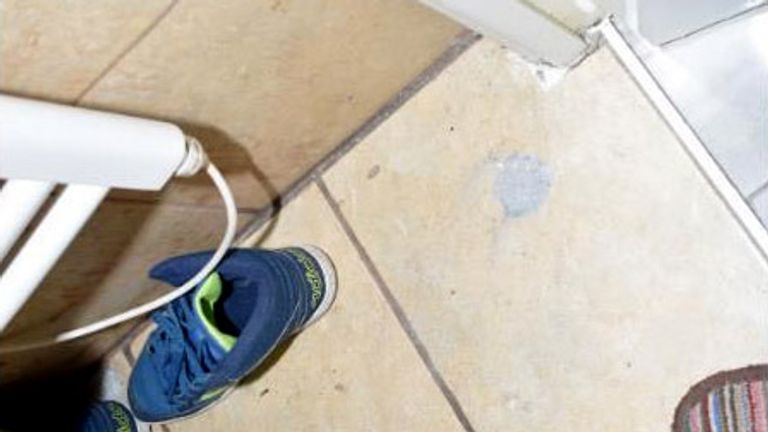 The remains of Aluminum Phosphide fumigation tablets in the bathroom of Flat 2, Nida house in Shadwel.  Photo: CPS/PA