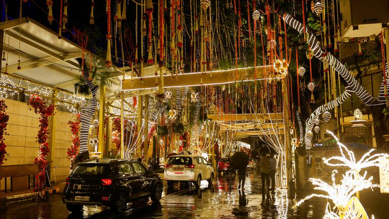 Cars near the decorated home of Mukesh Ambani. Pic: Reuters