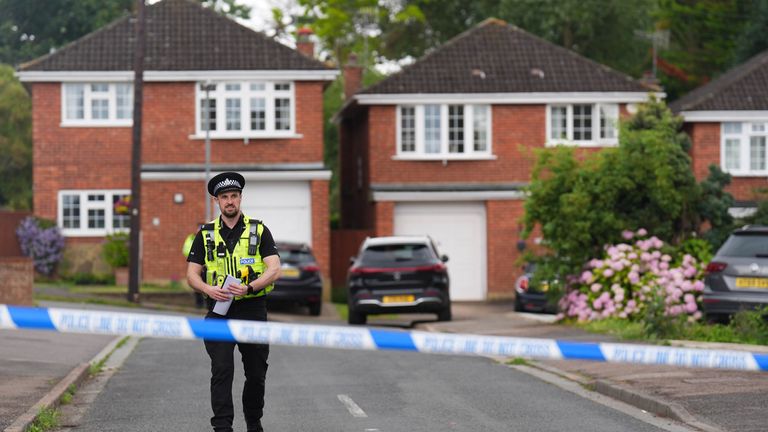 Police at the scene in Ashlyn Close, Bushey.
Pic: PA