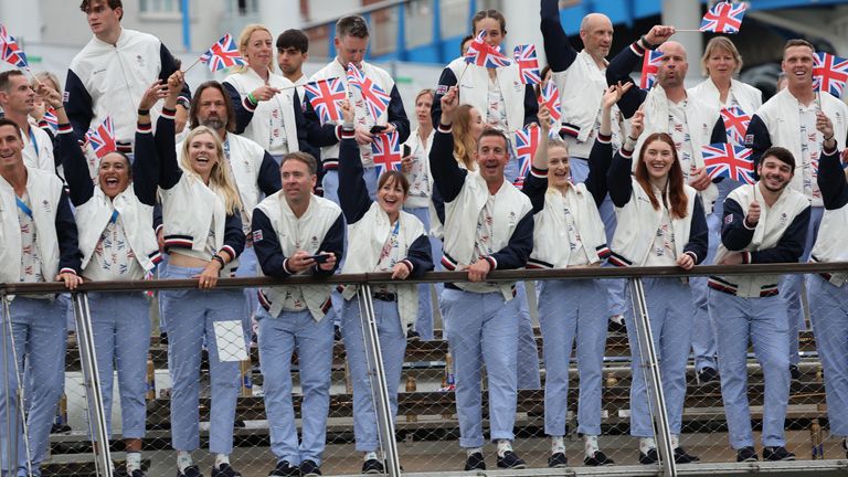 Paris 2024 Olympics - Opening Ceremony - Paris, France - July 26, 2024. Athletes of Great Britain are seen aboard a boat in the floating parade on the river Seine during the opening ceremony. Pool via REUTERS/Nir Elias
