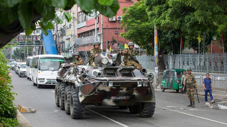 Soldiers on armoured vehicle patrol in Dhaka.
Pic: AP